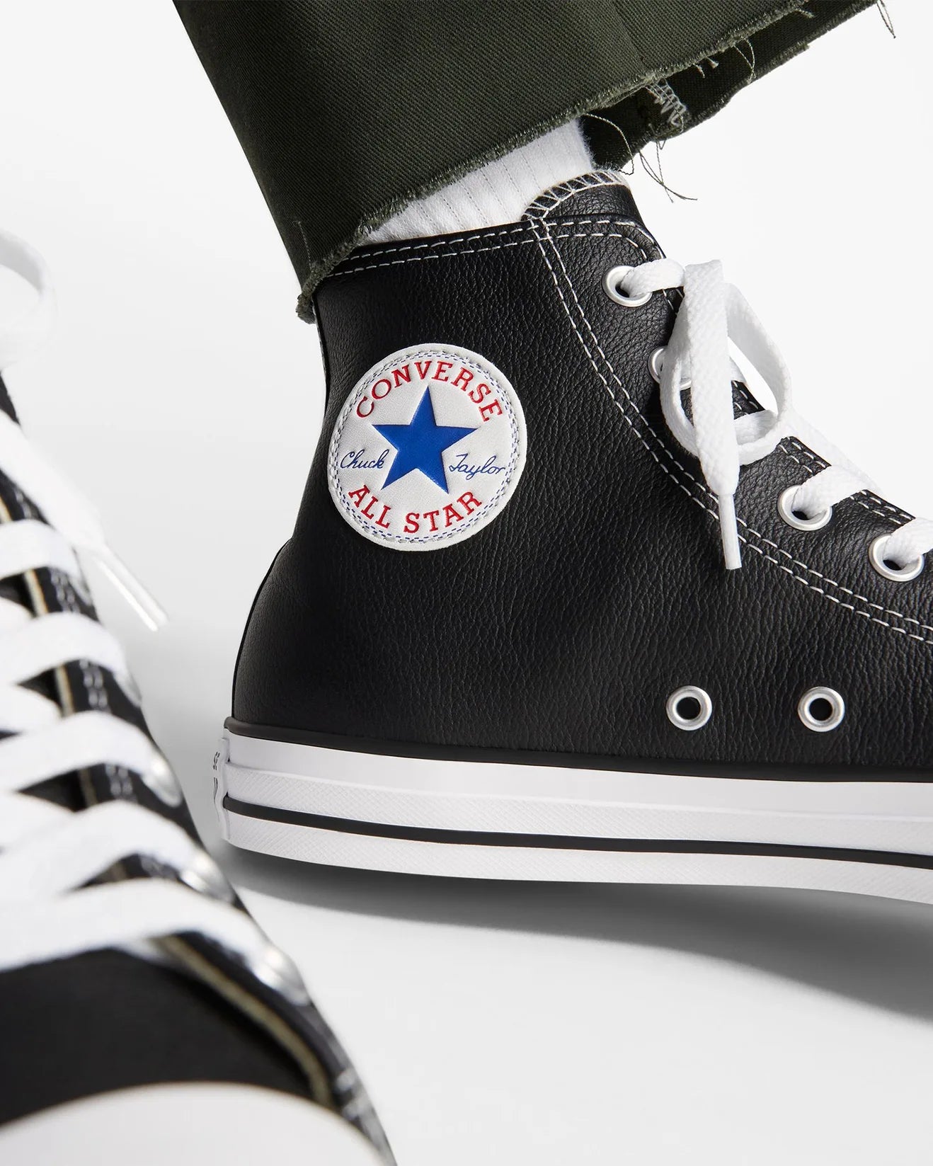 Leather chuck taylors high top hotsell