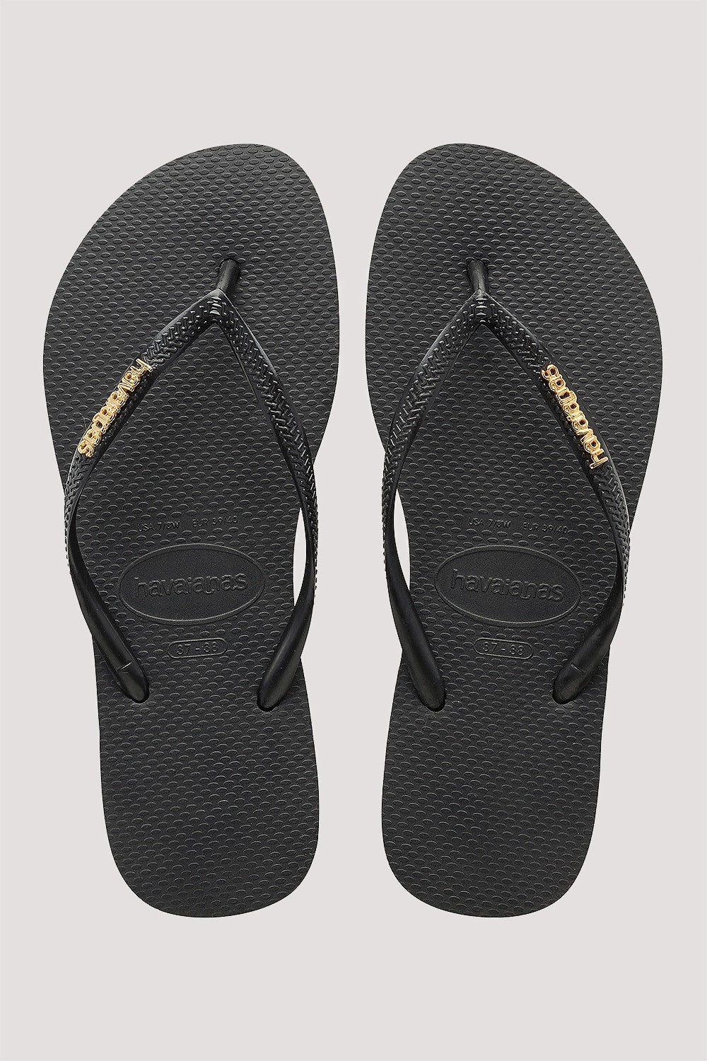 HAVAIANAS SLIM LOGO METALLIC JANDAL - BLACK/GOLD